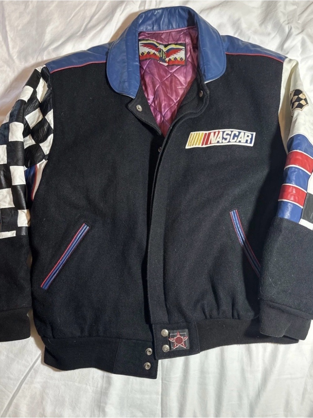 JH Collectibles Black NASCAR Varsity Jacket with Blue Collar